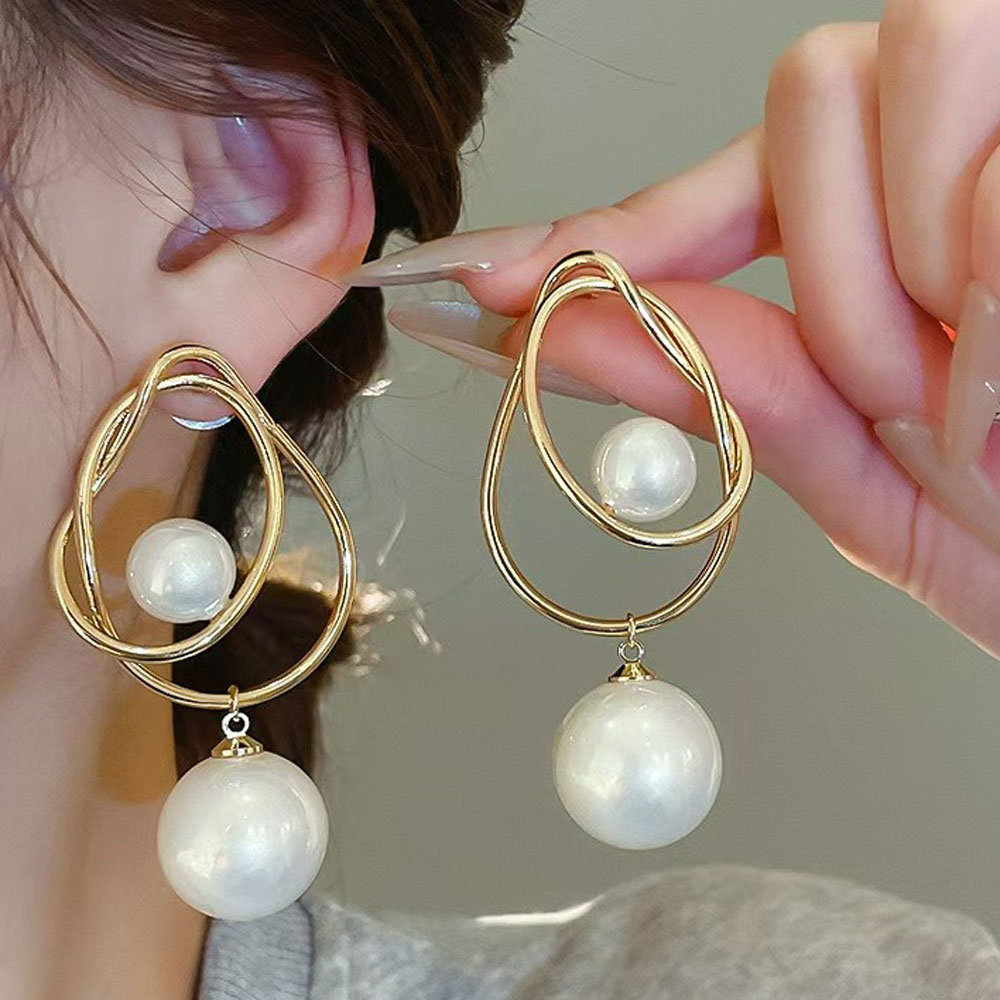 Σκουλαρίκια Ατσάλι Στριφτό Οβάλ με Πέρλες - Χρυσό Σκουλαρίκια Ατσάλι Στριφτό Οβάλ με Πέρλες - ΧρυσόX00397A