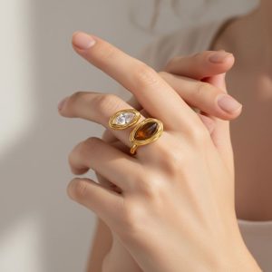 Δαχτυλίδι Ατσάλι Διπλή Οβάλ Πέτρα Καφέ Χρυσό Χρώμα Με Προσαρμοζόμενο ΜέγεθοςX00452-6