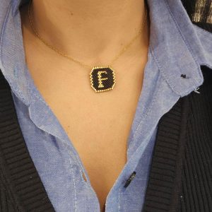 Ατσάλινο Μονόγραμμα ''F'' Με Μαύρες Και Χρυσές ΧάντρεςA23016F