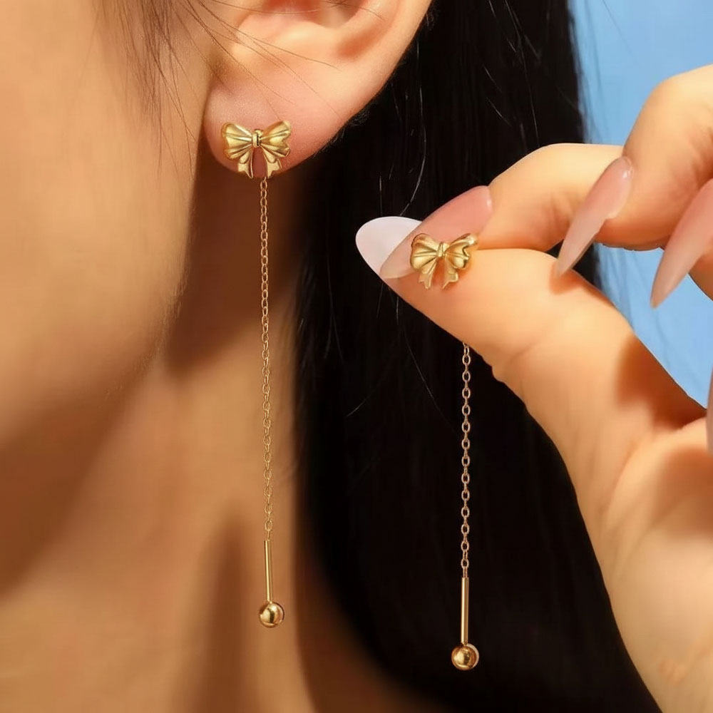 Ατσάλινα Σκουλαρίκια με Διακοσμητικό Φιόγκο Χρυσό Χρώμα Ατσάλινα Σκουλαρίκια με Διακοσμητικό Φιόγκο Χρυσό ΧρώμαA70015